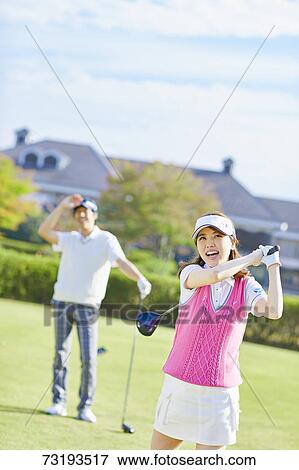 Japanese golf players on course View Large Photo Image Stock Photo - Japanese golf players on course. Fotosearch