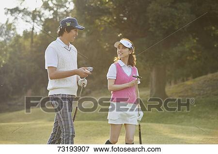 Japanese golf players on course View Large Photo Image Stock Photo - Japanese golf players on course. Fotosearch
