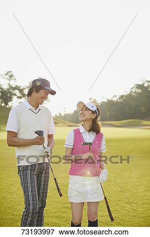 Japanese golf players on course View Large Photo Image Stock Photo - Japanese golf players on course. Fotosearch