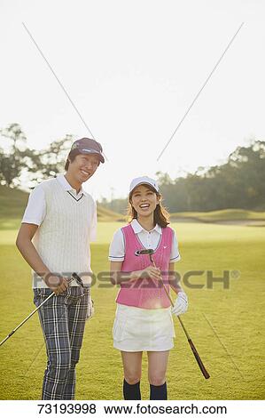 Japanese golf players on course View Large Photo Image Stock Photo - Japanese golf players on course. Fotosearch