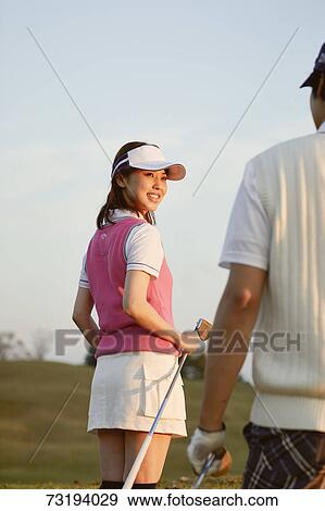 Japanese golf players on course View Large Photo Image Stock Photo - Japanese golf players on course. Fotosearch