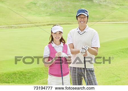 Japanese golf players on course View Large Photo Image Stock Photo - Japanese golf players on course. Fotosearch
