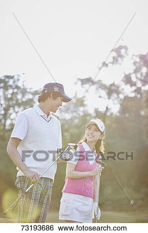 Japanese golf players on course View Large Photo Image Stock Photograph - Japanese golf players on course. Fotosearch