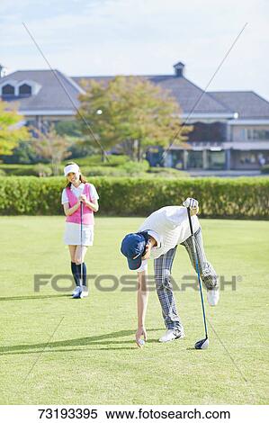 Japanese golf players on course View Large Photo Image Stock Photography - Japanese golf players on course. Fotosearch