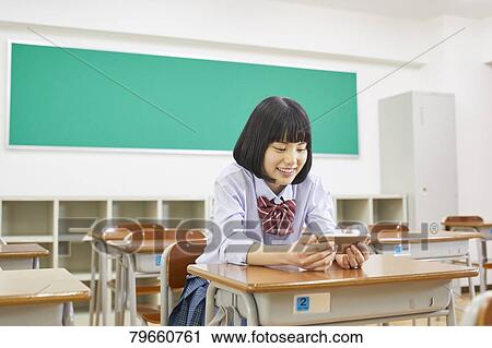 Stock Image - Japanese high-school girl. Fotosearch
