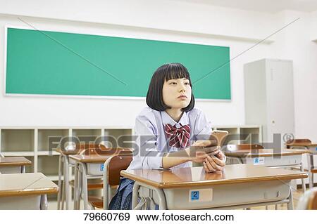 Stock Photo - Japanese high-school girl. Fotosearch