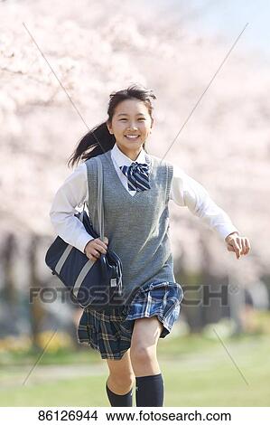 Picture - Japanese junior-high schoolgirl in uniform. Fotosearch