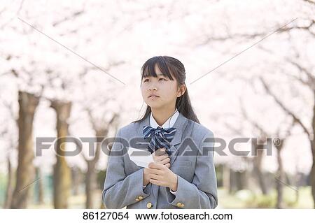 Japanese junior-high schoolgirl in uniform View Large Photo Image Picture - Japanese junior-high schoolgirl in uniform. Fotosearch