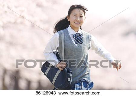 Japanese junior-high schoolgirl in uniform View Large Photo Image Stock Image - Japanese junior-high schoolgirl in uniform. Fotosearch