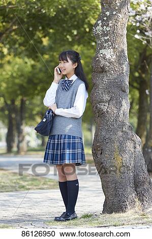 Japanese junior-high schoolgirl in uniform View Large Photo Image Stock Image - Japanese junior-high schoolgirl in uniform. Fotosearch