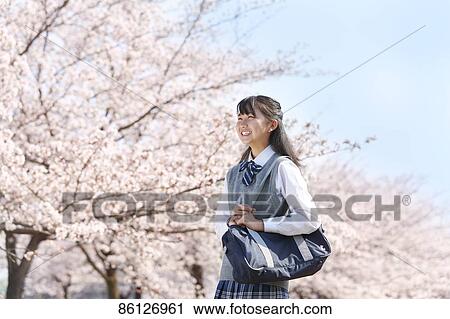 Japanese junior-high schoolgirl in uniform View Large Photo Image Stock Image - Japanese junior-high schoolgirl in uniform. Fotosearch