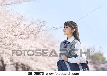 Stock Image - Japanese junior-high schoolgirl in uniform. Fotosearch