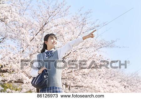 Stock Image - Japanese junior-high schoolgirl in uniform. Fotosearch