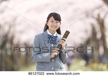 Japanese junior-high schoolgirl in uniform View Large Photo Image Stock Image - Japanese junior-high schoolgirl in uniform. Fotosearch