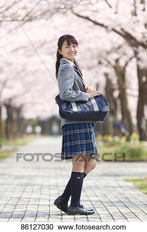 Japanese junior-high schoolgirl in uniform View Large Photo Image Stock Image - Japanese junior-high schoolgirl in uniform. Fotosearch