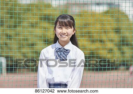 Japanese junior-high schoolgirl in uniform View Large Photo Image Stock Image - Japanese junior-high schoolgirl in uniform. Fotosearch