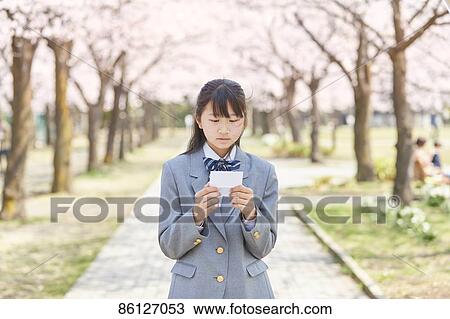 Japanese junior-high schoolgirl in uniform View Large Photo Image Stock Image - Japanese junior-high schoolgirl in uniform. Fotosearch
