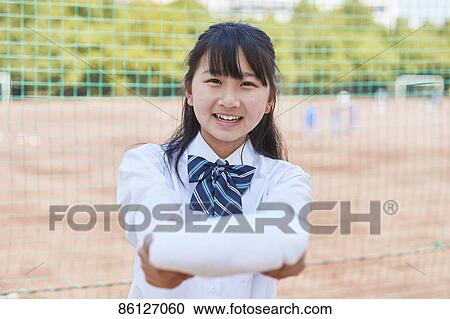 Japanese junior-high schoolgirl in uniform View Large Photo Image Stock Image - Japanese junior-high schoolgirl in uniform. Fotosearch