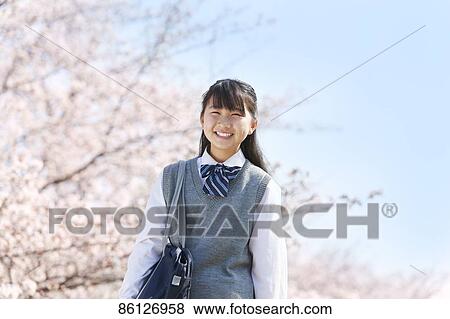 Japanese junior-high schoolgirl in uniform View Large Photo Image Stock Photo - Japanese junior-high schoolgirl in uniform. Fotosearch