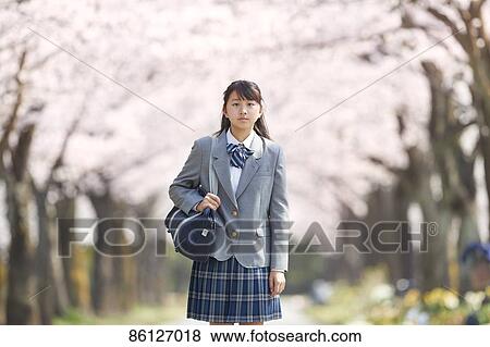 Japanese junior-high schoolgirl in uniform View Large Photo Image Stock Photo - Japanese junior-high schoolgirl in uniform. Fotosearch