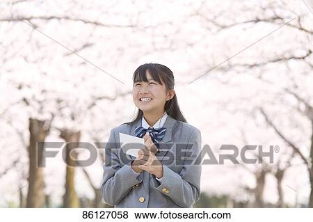Japanese junior-high schoolgirl in uniform View Large Photo Image Stock Photo - Japanese junior-high schoolgirl in uniform. Fotosearch