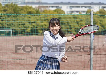 Stock Photograph - Japanese junior-high schoolgirl in uniform. Fotosearch