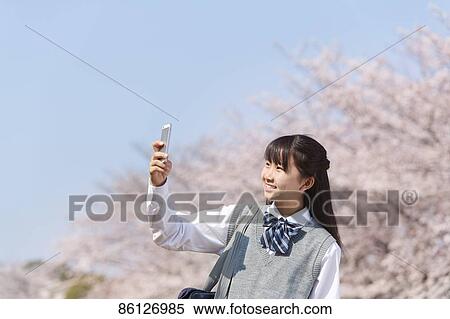 Stock Photography - Japanese junior-high schoolgirl in uniform. Fotosearch