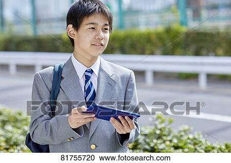 Stock Image - Japanese junior high student. Fotosearch