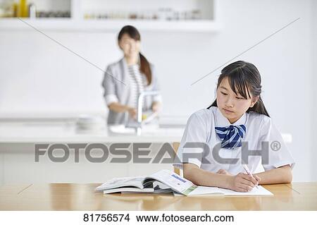 Japanese junior high student studying at home View Large Photo Image Picture - Japanese junior high student studying at home. Fotosearch