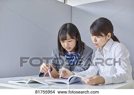 Japanese junior high student with teacher View Large Photo Image Picture - Japanese junior high student with teacher. Fotosearch