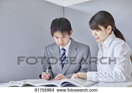 Japanese junior high student with teacher View Large Photo Image Picture - Japanese junior high student with teacher. Fotosearch