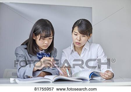 Japanese junior high student with teacher View Large Photo Image Stock Photo - Japanese junior high student with teacher. Fotosearch