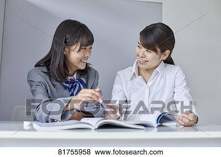 Japanese junior high student with teacher View Large Photo Image Stock Photo - Japanese junior high student with teacher. Fotosearch