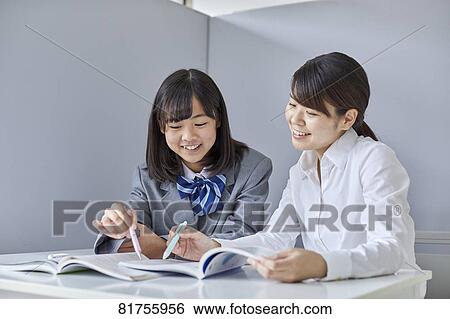 Japanese junior high student with teacher View Large Photo Image Stock Photograph - Japanese junior high student with teacher. Fotosearch