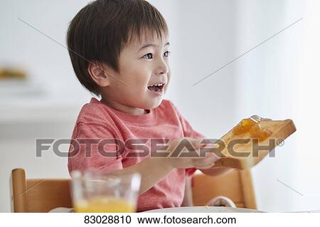 Japanese kid having breakfast View Large Photo Image Stock Image - Japanese kid having breakfast. Fotosearch