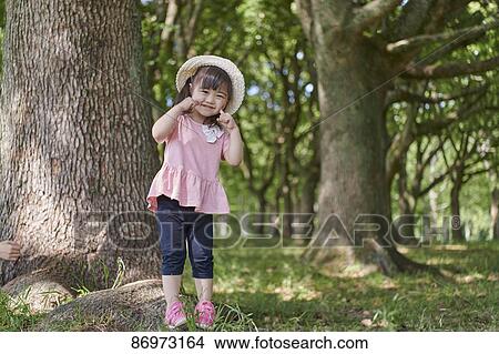 Japanese kid in a city park View Large Photo Image Picture - Japanese kid in a city park. Fotosearch
