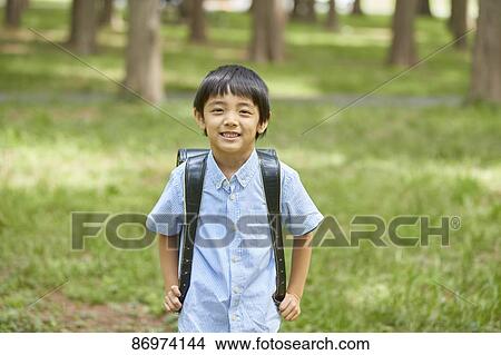 Japanese kid in a city park View Large Photo Image Picture - Japanese kid in a city park. Fotosearch