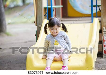 Japanese kid in a city park View Large Photo Image Stock Image - Japanese kid in a city park. Fotosearch
