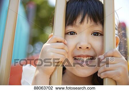 Japanese kid in a city park View Large Photo Image Stock Image - Japanese kid in a city park. Fotosearch