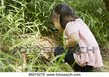 Japanese kid in a city park View Large Photo Image Stock Photo - Japanese kid in a city park. Fotosearch