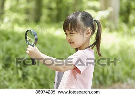Japanese kid in a city park View Large Photo Image Stock Photography - Japanese kid in a city park. Fotosearch
