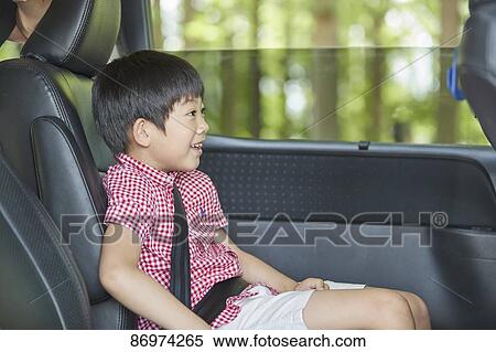 Japanese kid in the car View Large Photo Image Stock Photography - Japanese kid in the car. Fotosearch