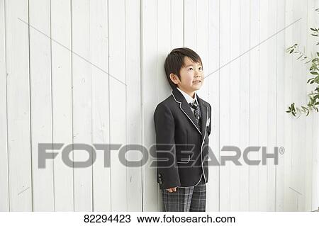 Stock Image - Japanese kid studio photo shoot. Fotosearch