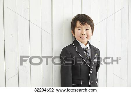 Stock Image - Japanese kid studio photo shoot. Fotosearch