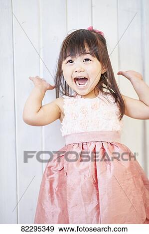 Stock Photo - Japanese kid studio photo shoot. Fotosearch