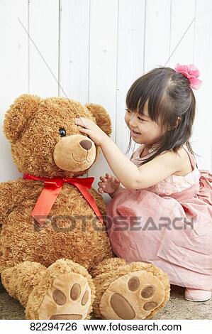 Stock Photograph - Japanese kid studio photo shoot. Fotosearch