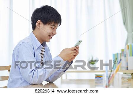 Japanese kid studying at home View Large Photo Image Picture - Japanese kid studying at home. Fotosearch
