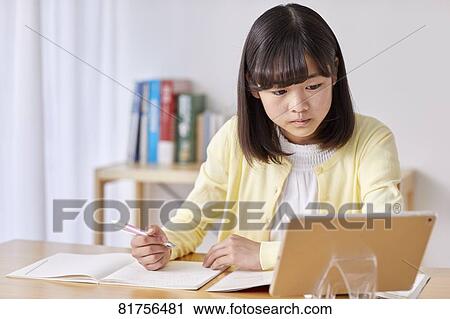 Japanese kid studying at home View Large Photo Image Stock Image - Japanese kid studying at home. Fotosearch