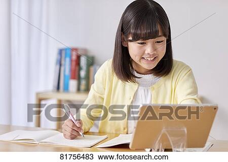 Japanese kid studying at home View Large Photo Image Stock Image - Japanese kid studying at home. Fotosearch
