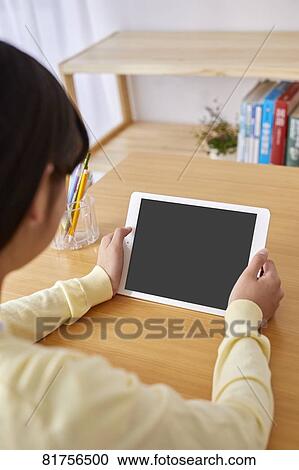 Japanese kid studying at home View Large Photo Image Stock Image - Japanese kid studying at home. Fotosearch